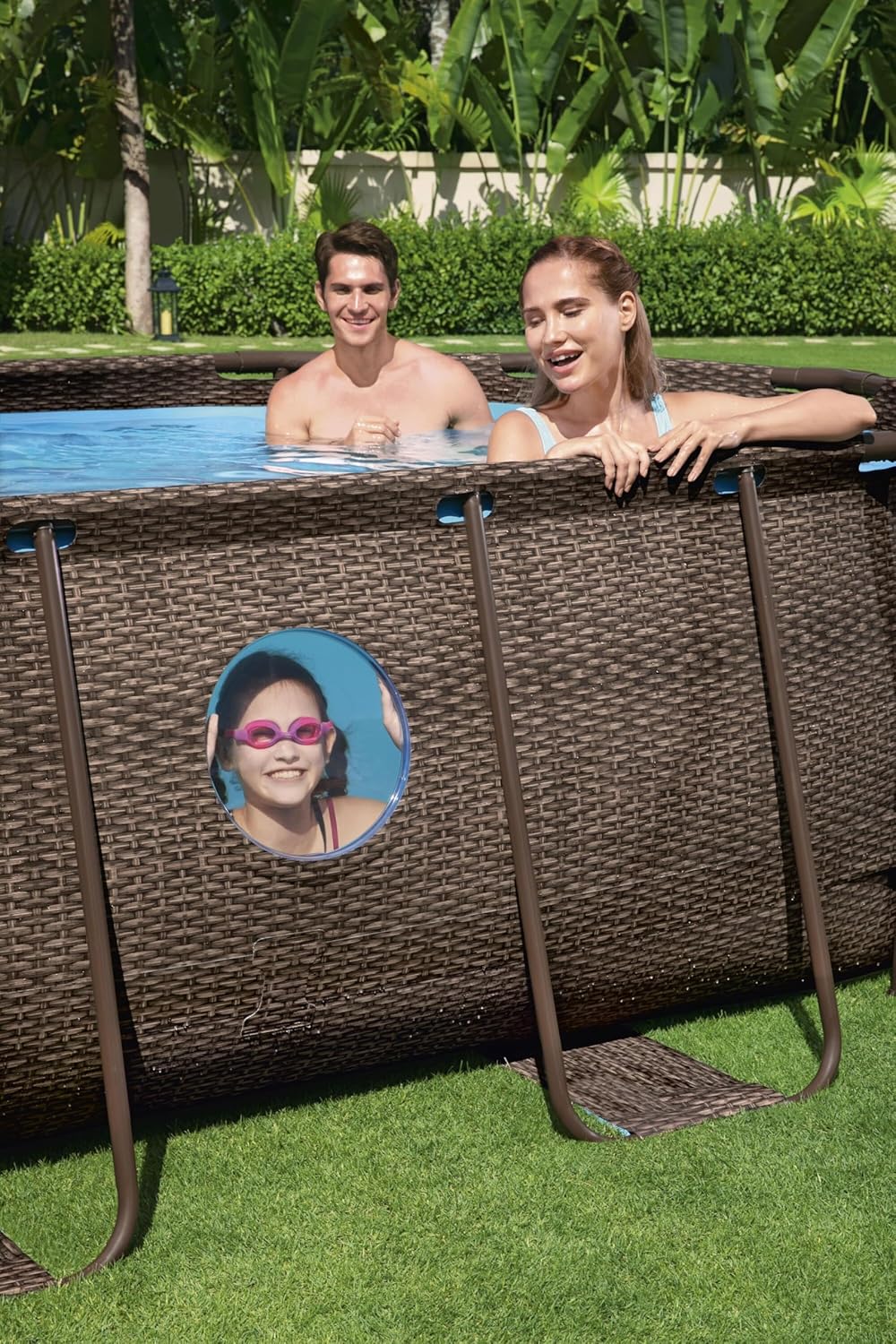 56946 Power Steel? Swim Vista oval pool 488 x 305 x 107 cm rattan pattern with portholes, sand filtration, ladder, cover and Chemconnect? diffuser